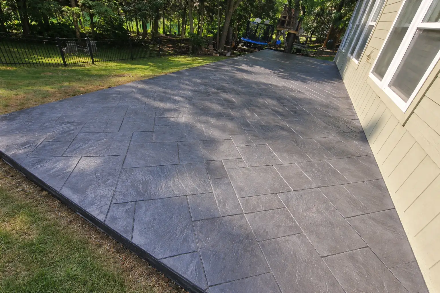 Stamped concrete patio with ashlar slate pattern in Kansas City